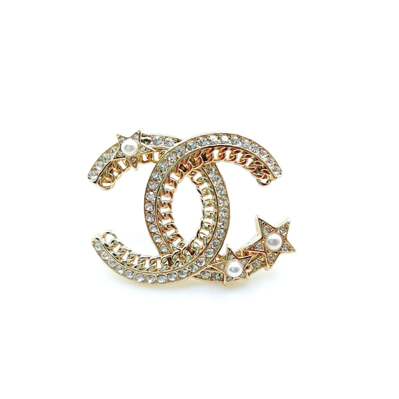 Ch*el brooches